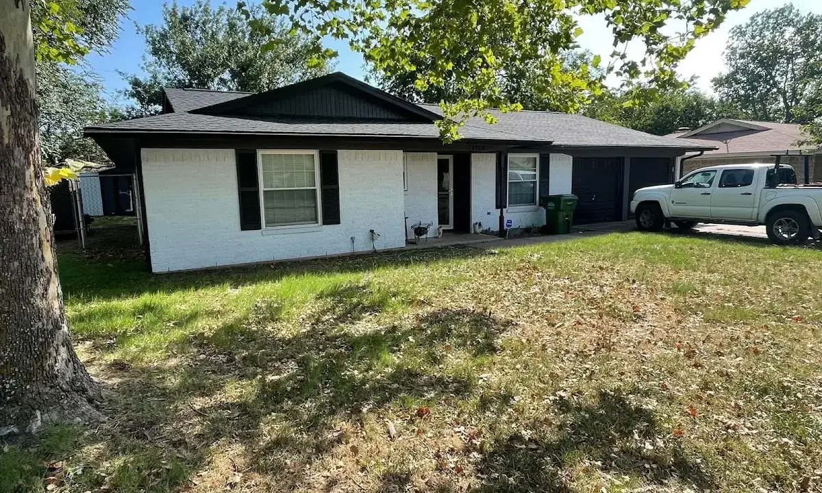 Professional roofing crew working on a residential roof in Brookings